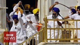 Sikh groups clash with swords at Indias Golden Temple  BBC News [upl. by Haletky956]