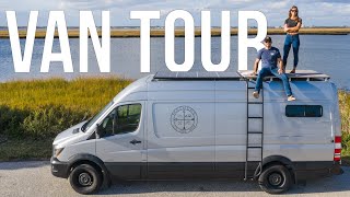 DIY VAN TOUR  FullTime Travel Couple  Shower Roof Deck and Convertible Bed  Van Life [upl. by Nniroc]